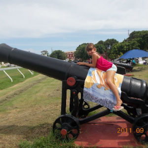 Girl on Cannon at Historic Garrison, Barbados